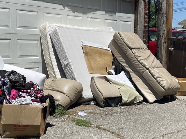 Mattresses are piled up in this Princeton Heights alley.