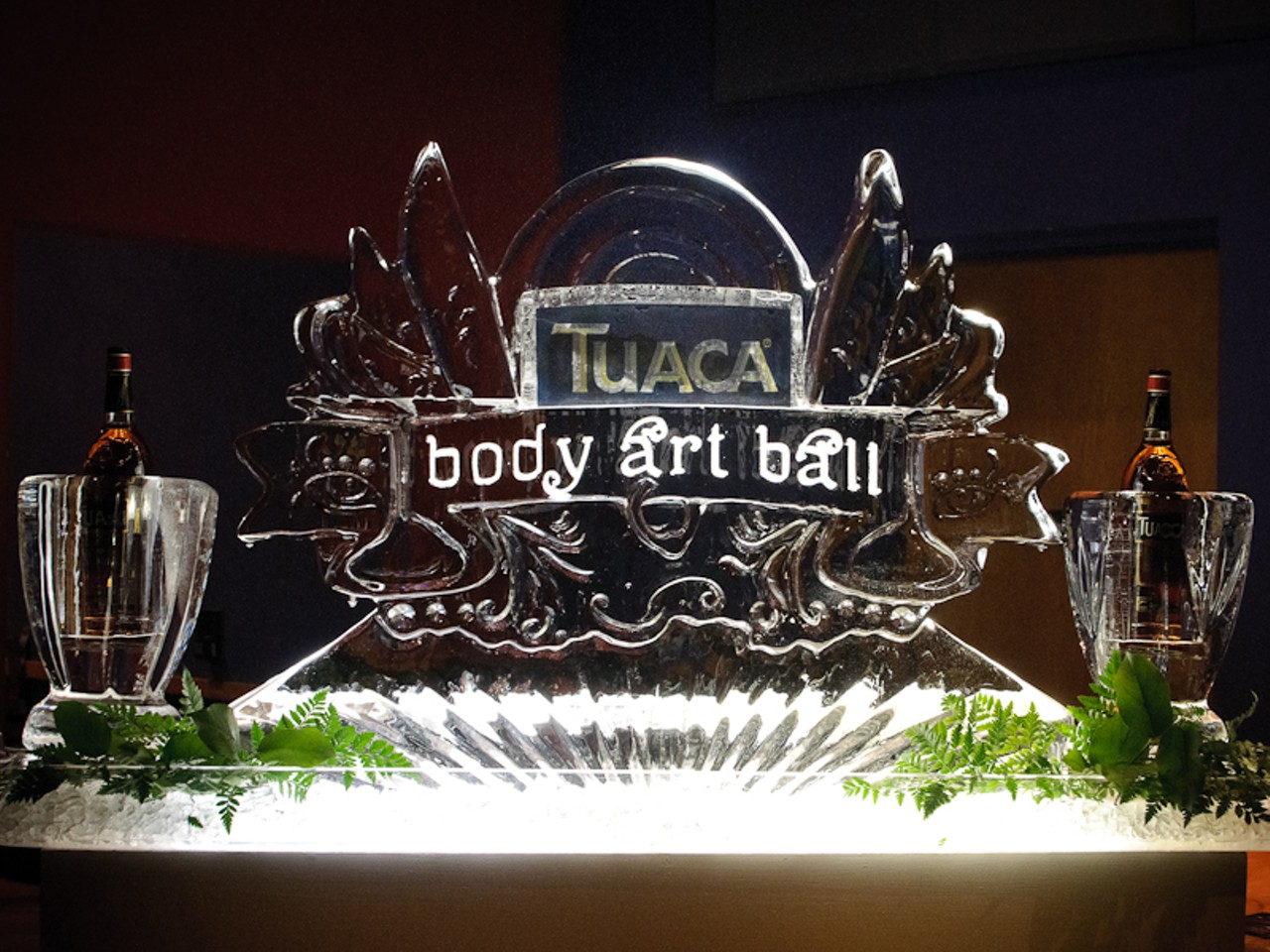 Tuaca acts as a sponsor for the event, providing beverages and funding for the Body Art Ball.