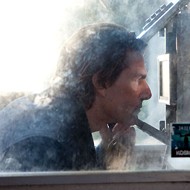<i>Ghost Protocol</i> lets Tom Cruise, Bankable Movie Star, live another day