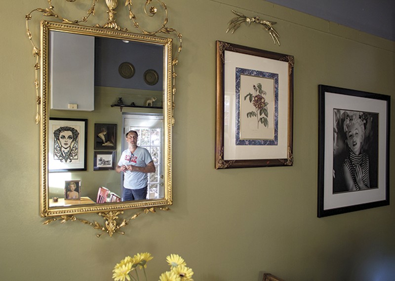 The decor in Kevin's Place includes Antique Row merch and portraits of Marilyn Monroe (who reminds him of an ex-girlfriend). - PHOTO BY SARA BANNOURA