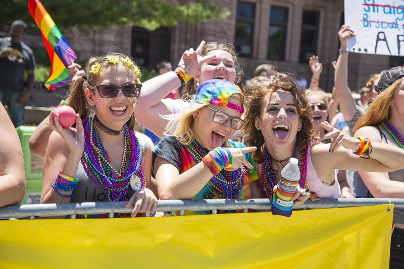 Pridefest attendees celebrate the LGBTQ community in downtown St. Louis. - PHOTO BY SARA BANNOURA