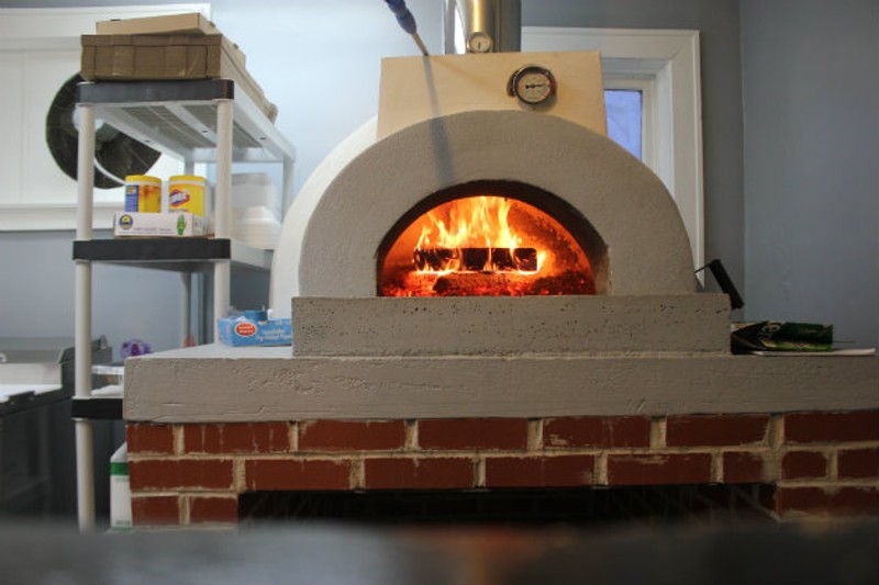 Eni's pizzas are cooked in a wood oven. - Cheryl Baehr