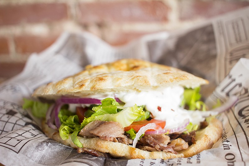 The doner kebab comes with lettuce, cucumbers, tomatoes, red onions and tzatziki on housemade somun bread. - MABEL SUEN