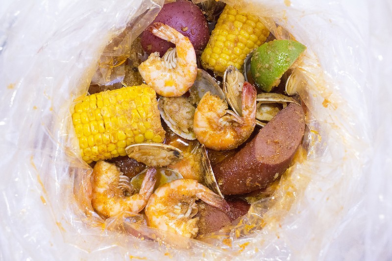 Combos come with your choice of seasoning -- lemon pepper. Ragin' Cajun or garlic -- or the "Whole Shabang," which includes all three. - MABEL SUEN