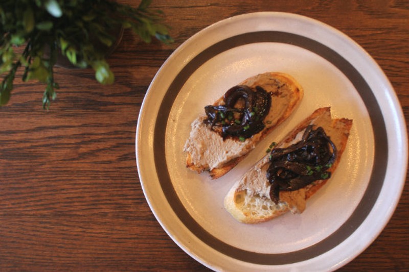 Chicken liver is served on crostini with balsamic onions. - Cheryl Baehr