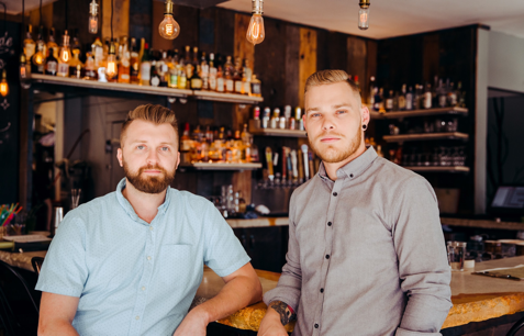 Travis Howard and Tim Wiggins of Retreat Gastropub and Yellowbelly. - Photo courtesy of Andrew Trinh Photography.