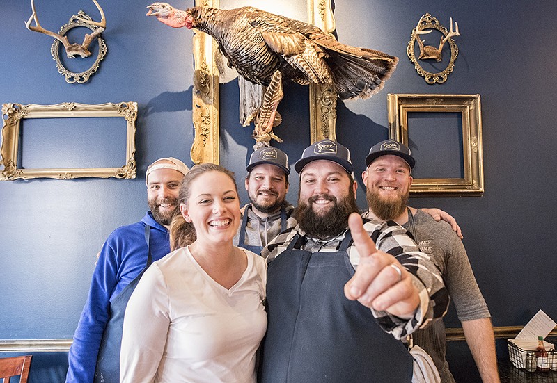 Co-owners Elisa and Rick Lewis are flanked by (back row from left) chef de cuisine Kevin McCulloch, pit boss Chris Maugh and sous chef Daniel Poss. - MABEL SUEN