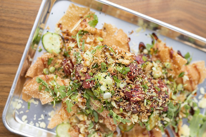 The "Shake Poke" nachos are a standout on a menu full of great things. - MABEL SUEN