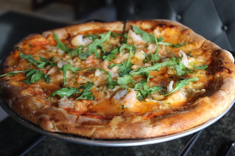 The lobster and shrimp pizza is topped with both shellfish and an orange-tarragon gremolata. - SARAH FENSKE