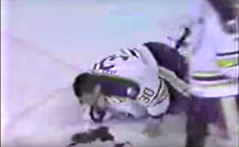 A wounded Clint Malarchuk gushes blood on the ice. - SCREENSHOT