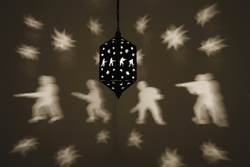 Misbah, 2006–07. Brass lantern, metal chain, light bulb and rotating electric motor, dimensions variable. Rennie Collection, Vancouver. © Mona Hatoum. Image courtesy of Fondazione Querini Stampalia Onlus, Venice. Photo: Agostino Osio