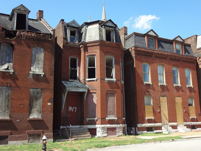 Vacant homes in the city's Hyde Park neighborhood. - FLICKR/PAUL SABLEMAN