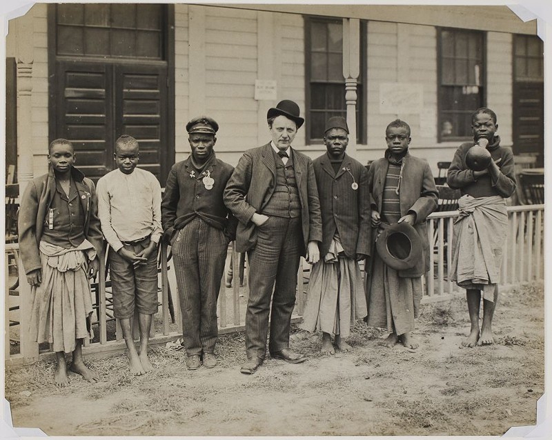 Samuel Phillips Verner (center) with random Africans he bought at the behest of Louisiana Purchase Exposition and passed off as "pygmies" at World's Fair. - LIBRARY OF CONGRESS