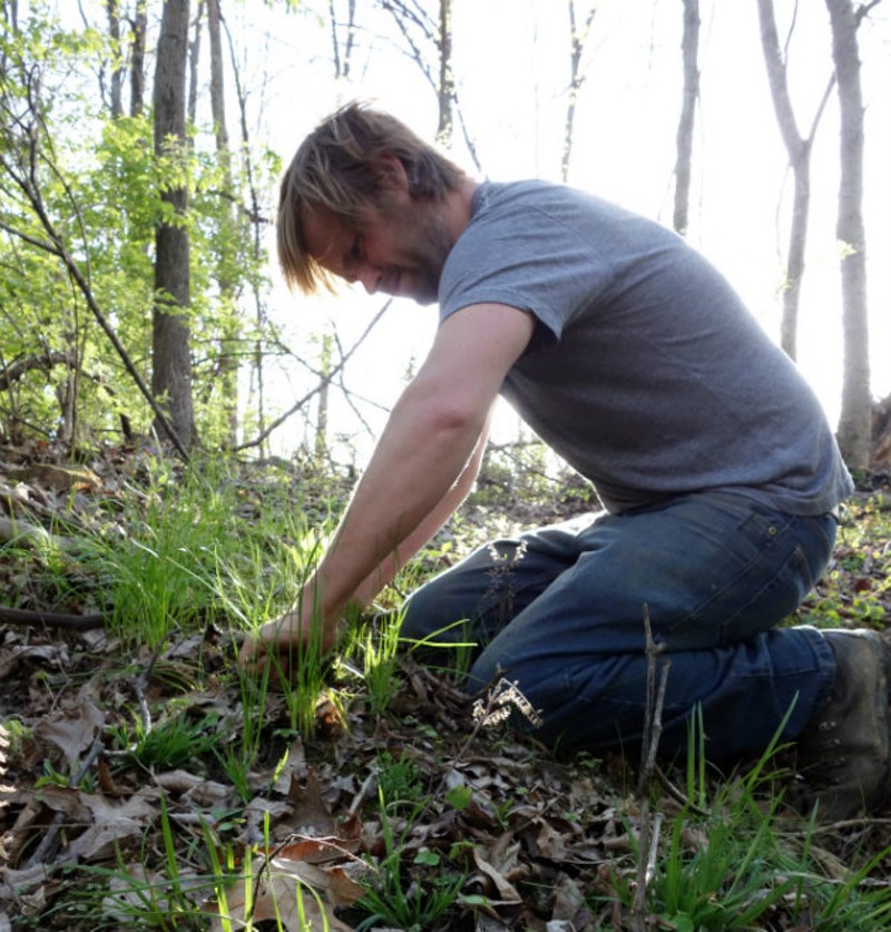 Aaron Kleidon scouring the land for ingredients. - COURTESY OF SCRATCH BREWING COMPANY