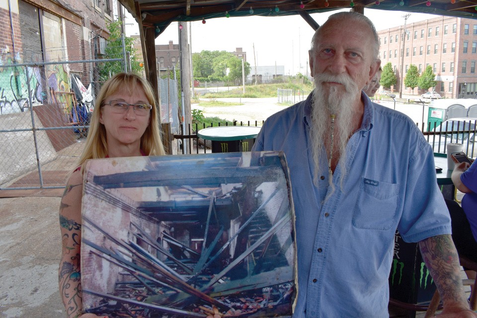 Jack Larrison, owner of Shady Jack’s, and his wife Ann show the state of their building before they rehabbed it. - DANIEL HILL