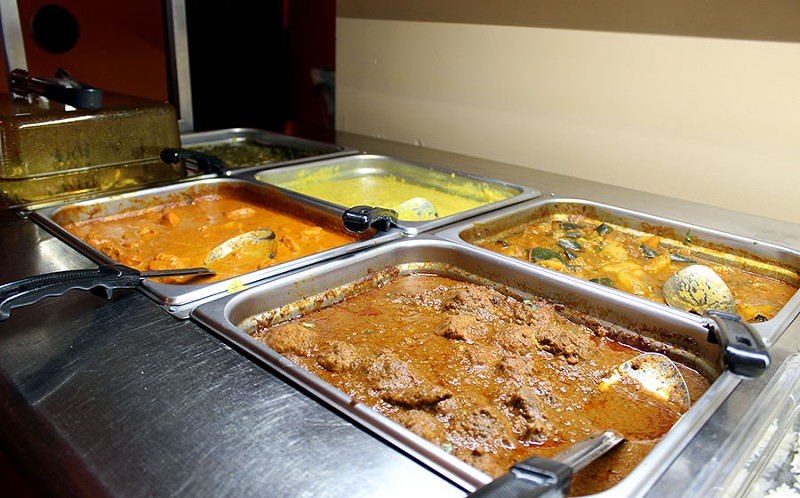 There are several meat options for lunch including chicken tikka masala, tandoori chicken and yellow dal. - LEXIE MILLER