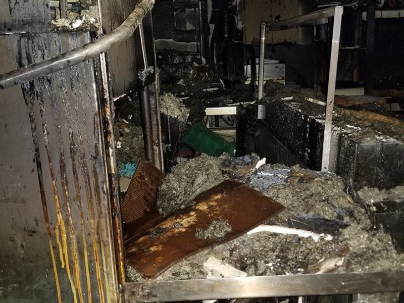 The fire-damaged kitchen inside Billie's Fine Foods. - Courtesy of Lauren Zych