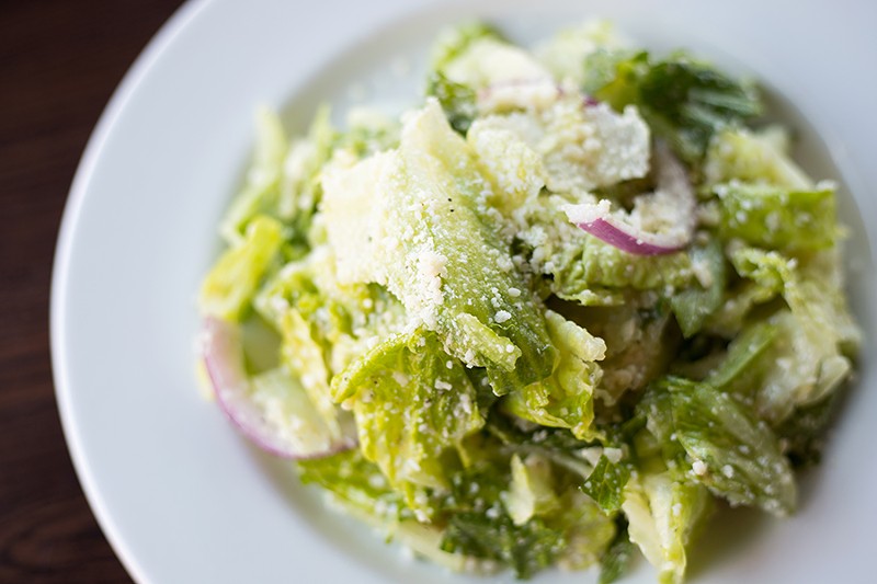 Del Pietro's signature salad incorporates red onions, provolone, Parmigiano cheese and red-wine vinaigrette. - MABEL SUEN