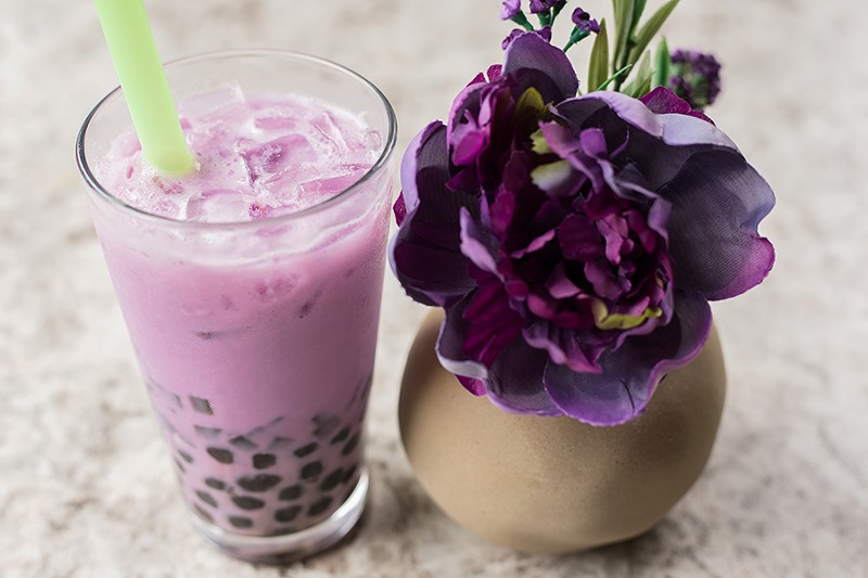 Taro bubble tea with tapioca pearls and green herb jelly. - MABEL SUEN