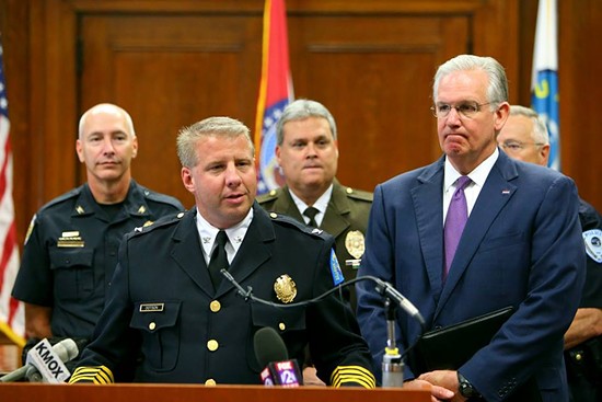 Police Chief Sam Dotson (front) with County Police Chief Tim Fitch (back) and Governor Jay Nixon. - Facebook / SLMPD