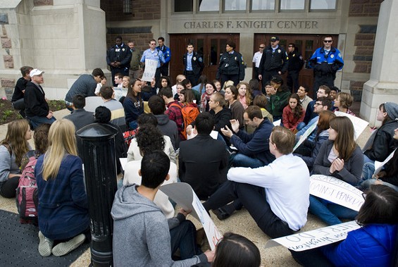 Students and non-student demonstrators protest Peabody Energy outside Washington University.