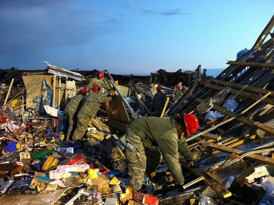 The Missouri National Guard, on the ground in Joplin. (It does kind of look like WW II, no?) - courtesy of the National Guard Bureau