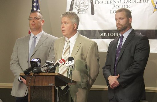(Left to right) St. Louis Police Officer's Association President Joe Steiger, business manager Jeff Roorda and Brian Millikan, the attorney for the officer who shot and killed Vonderitt Myers on October 8. - DANNY WICENTOWSKI