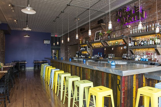 The bar at the Purple Martin in Fox Park, which is made from Refab material. - Corey Woodruff