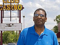 Club Casino owner Cedric Taylor stands in front of his nightclub on State Street in East St. Louis - Jennifer Silverberg