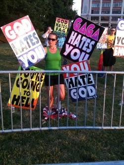 Megan Phelps, grand-daughter of Fred, protesting outside a St. Louis concert last week.