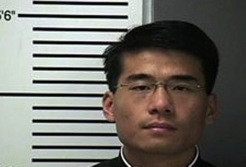 Father Joseph Jiang's mugshot.