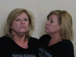Janice Lyles of Godfrey was arrested after passing out drunk in the Hardee's drive-thru
