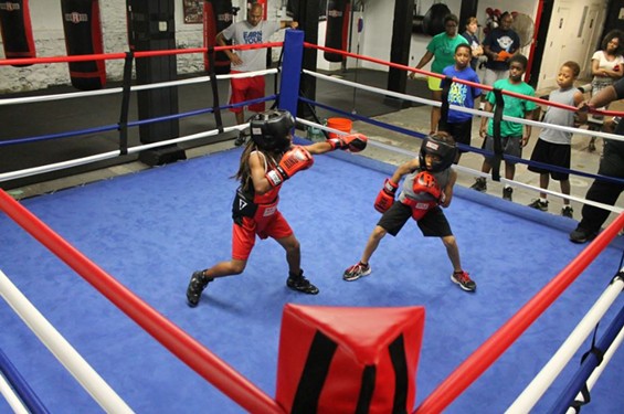 DeMarcus Murphy and Marcus Luther in a friendly spar at STL All City Boxing. - Ray Downs