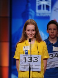 Platz, spelling. Speller 134 has reason to look so pissy; she made the semifinals and he did not. - Image source
