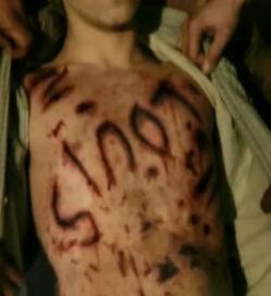 The word "Louis" appeared on the boy's chest. - thehauntedboymovie.blogspot.com