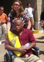 Gladney in a wheelchair two days after the alleged assault.