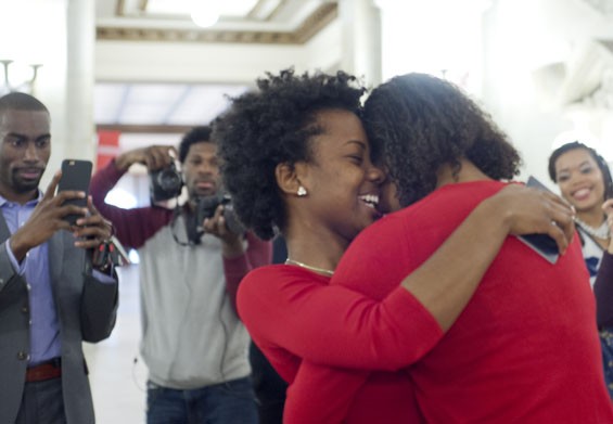 Ferrell and Templeton embrace after Ferrell says yes to her marriage proposal at St. Louis City Hall on December 16. Deray McKesson, another Ferguson activist, captures the moment for Twitter.