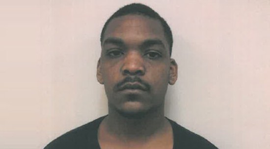 Marlon Miller's mug shot after he was wrongfully charged.