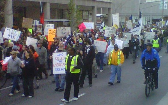 Occupy STL protesters march to the MLK Bridge yesterday afternoon. - Photos: Tony D'Souza