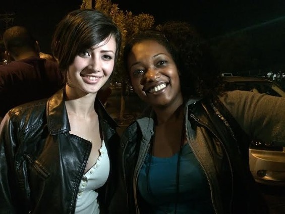 Sasha Pain (L) joins the protests in Ferguson with friend Jessica Bella Hollie. - LINDSAY TOLER