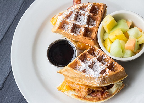 "Chicken 'n' Waffle Sandwich": fried chicken topped with cheddar and bacon in a buttermilk waffle.