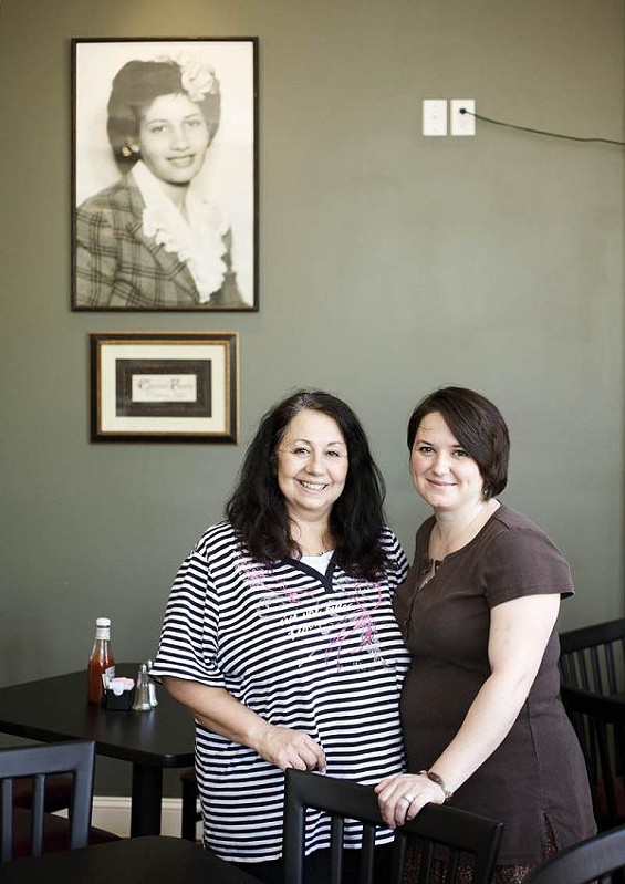 Owner Mary Samuelson (left) and daughter Amy Keller (right) posing below a portrait of Mary's mother and restaurant namesake, Josephine. - Jennifer Silverberg