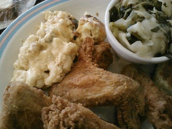 Chicken wings with mac & cheese and cabbage at Sweetie Pie's at the Mangrove - Sarah Rusnak