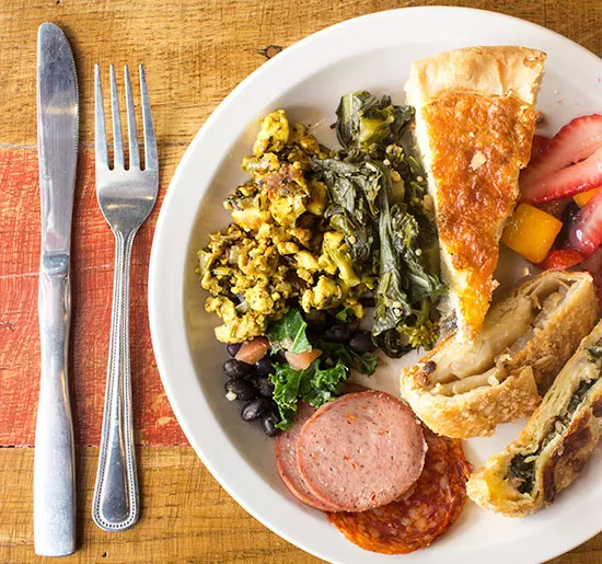 Tofu scramble, sesame-ginger greens, quiche, stollen, sausage and more. | Photos by Mabel Suen