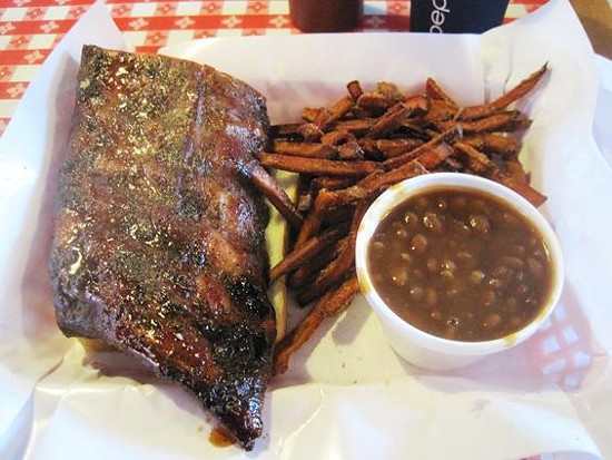Half a slab of ribs, with beans and sweet-potato fries, at Pappy's - Ian Froeb
