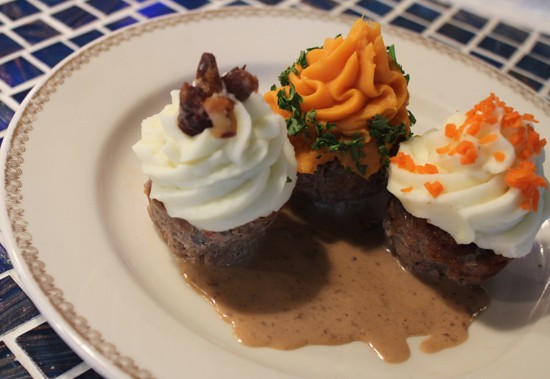Meatloaf cupcakes served with gravy and three different kinds of potato "frosting." - Mabel Suen