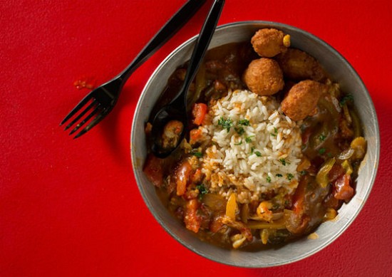 &Eacute;touff&eacute;e is a creole dish with peppers, onions, celery. Here, it's shown with crawfish, and served over a bed of rice at the Kitchen Sink. - Jennifer Silverberg
