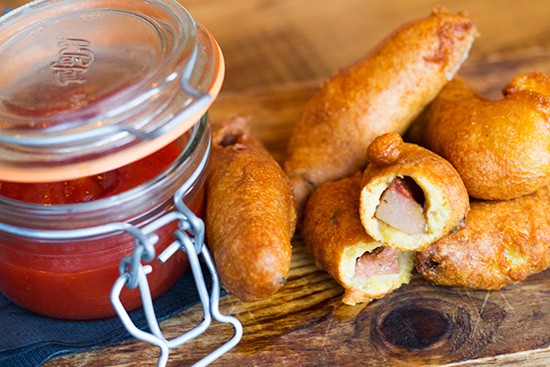 Andouille corn dogs with spicy ketchup.