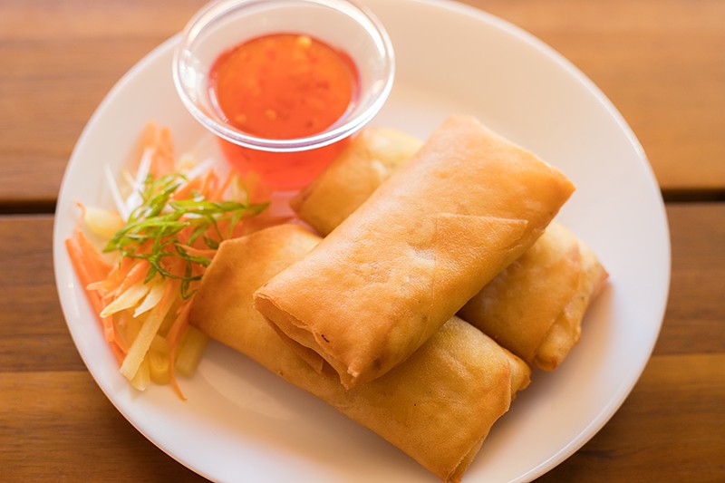 Crab rangoons are served with sweet chile sauce. - MABEL SUEN