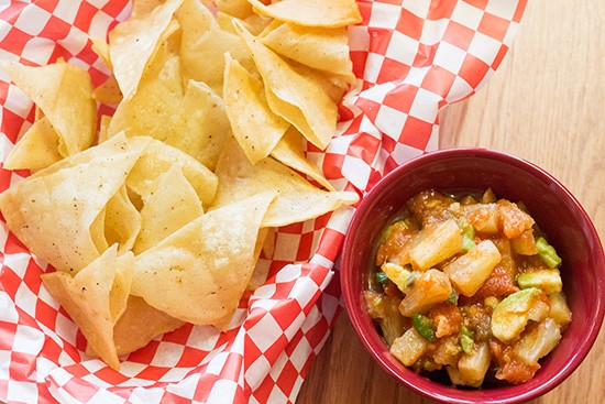 Pineapple and avocado salsa with chips.
